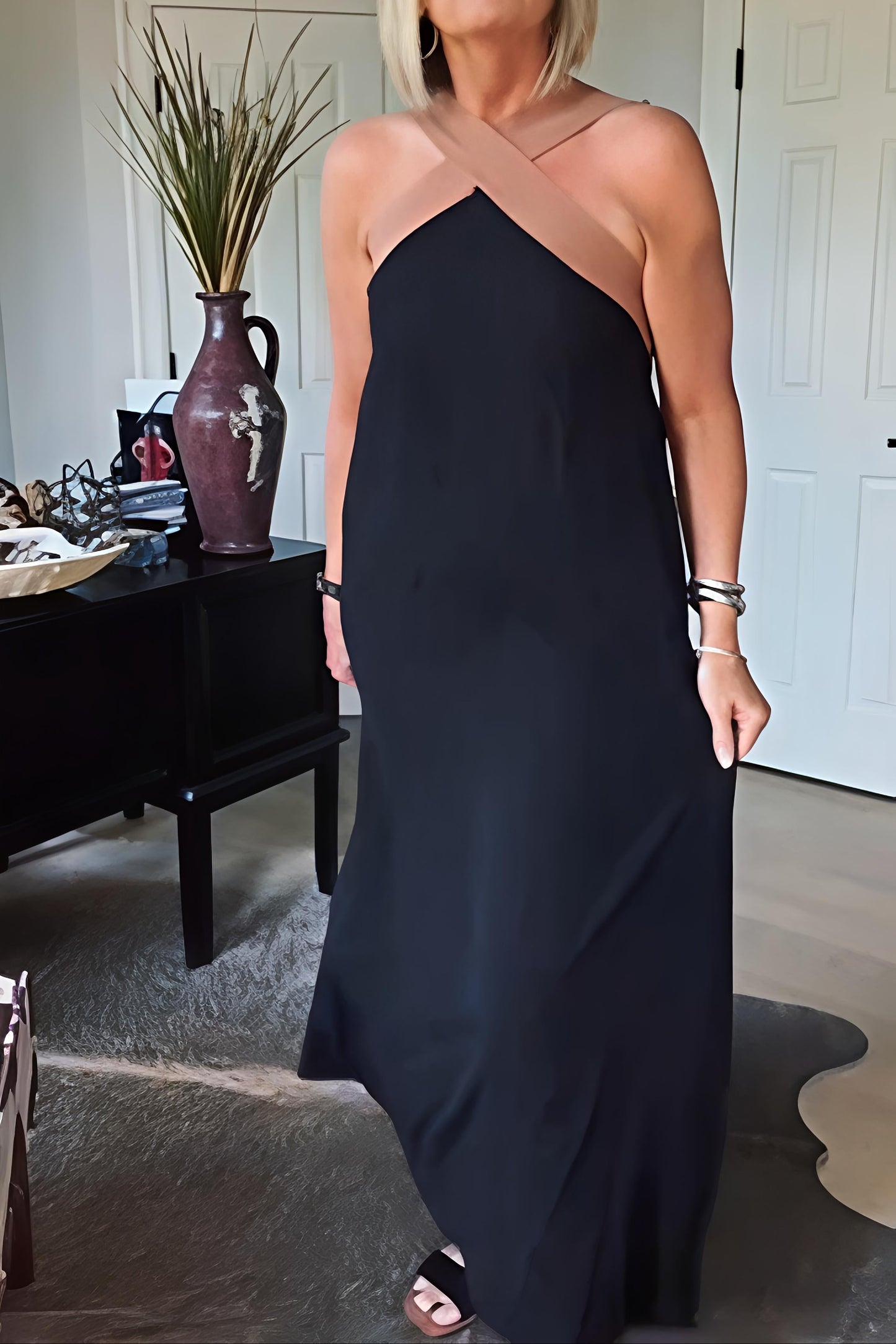 Elegant long dress with a flowing neckline