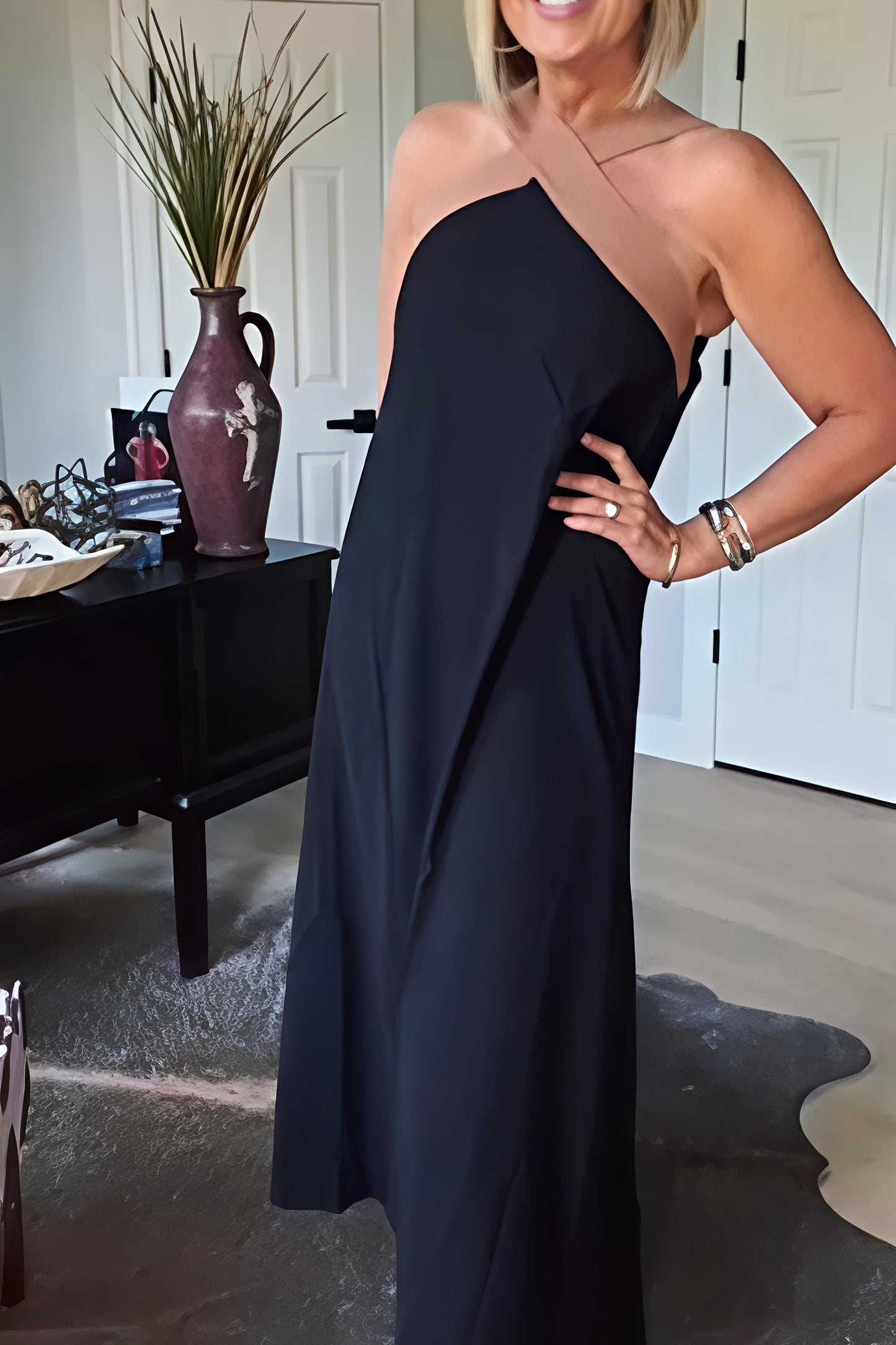 Elegant long dress with a flowing neckline
